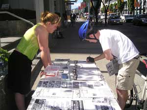 Petitioning at MAWO Picket - Armed Forces Recruitment Center July 28, 2005