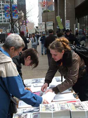 Petitioning at MAWO Picket - Canadian Armed Forces Recruitment Center - March 30, 2006
